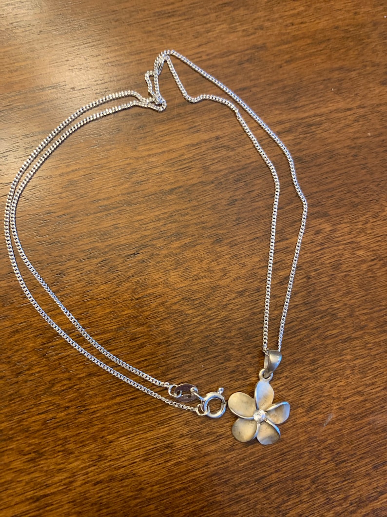 Sterling silver flower with cz necklace