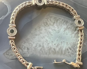 Sterling and  circle diamond design on wheat chain bracelet