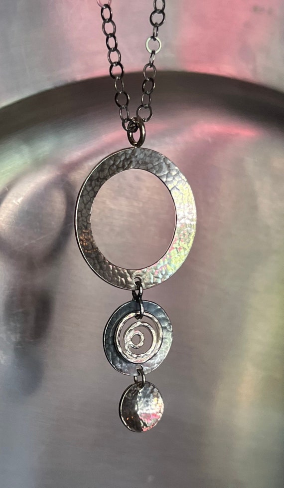 Vintage Silpada hammered open circle with swirls n
