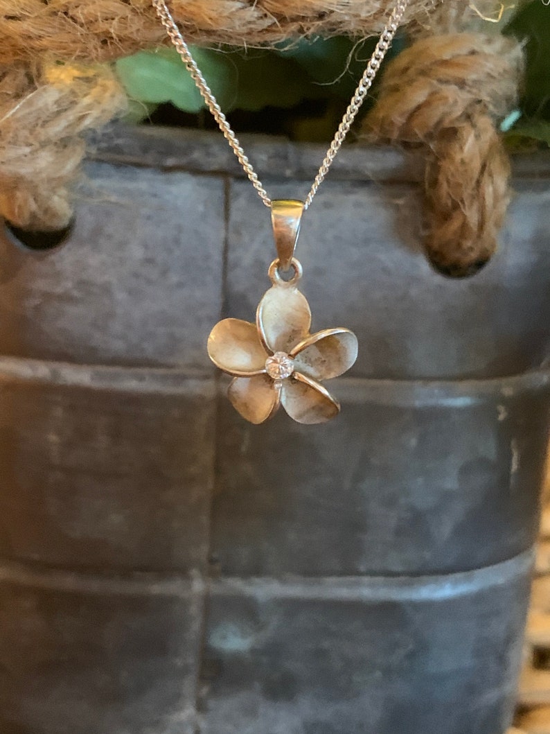 Sterling silver flower with cz necklace