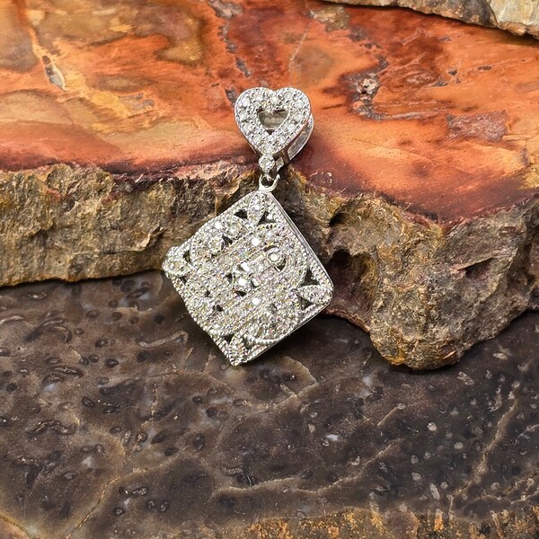 Sterling vintage and diamond pendant