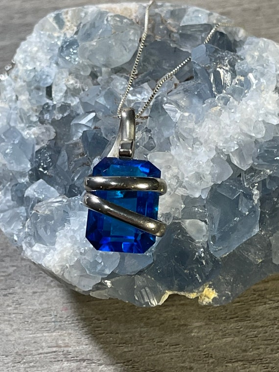 Blue emerald cut color treated quartz necklace