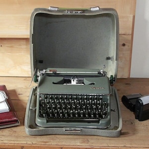 Old typewriter Olympia green vintage 50s image 1