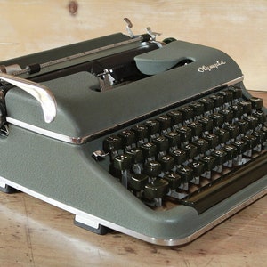 Old typewriter Olympia green vintage 50s image 7