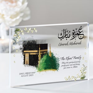 Clear acrylic block frame Umrah Mubarak gift. Printed with Islamic quote with personalised family name and quote with dates. Bestseller for Eid mubarak gifts and Muslim gifts for couples and families.