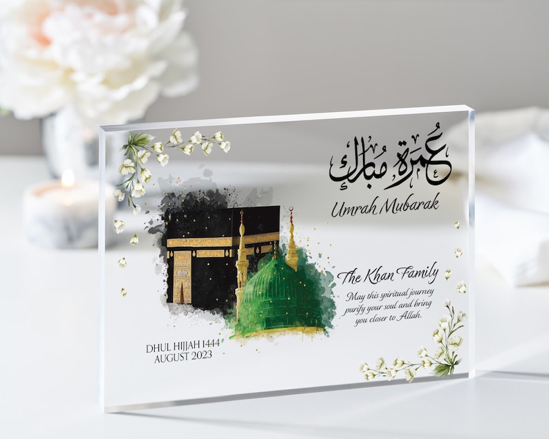 Clear acrylic block frame Umrah Mubarak gift. Printed with Islamic quote with personalised family name and quote with dates. Bestseller for Eid mubarak gifts and Muslim gifts for couples and families.