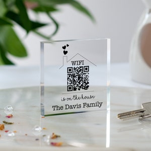 May include: A clear acrylic block with a black and white QR code, the text "WIFI is on the house The Davis Family" and two small hearts.