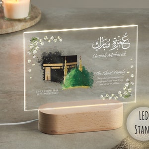LED plaque for Umrah Mubarak gift. Printed with Islamic quote with personalised family name and quote with dates. Bestseller for Eid mubarak gifts and Muslim gifts for couples and families.