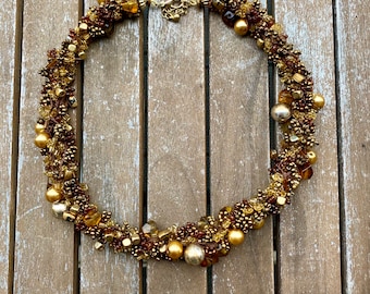 Crocheted glass bead necklace in brown and gold, fuzzy necklace