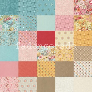 Könnte beinhalten: Ein Patchwork-Deckenstück mit verschiedenen floralen und geometrischen Mustern in Rosa-, Blau-, Gelb- und Brauntönen.