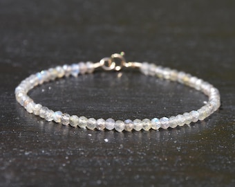 Labradorite and solid 14 karat gold bracelet, 3mm faceted iridescent Labradorite gemstone beads and 14k gold minimalist bracelet.  Unisex.