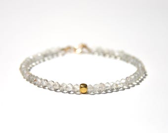 Aquamarine and solid gold bracelet, faceted pale Aquamarine with solid 18 karat gold nugget and 14 karat gold clasp