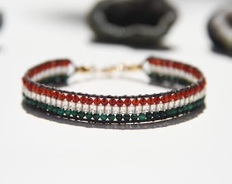 Carnelian, Citrine, and Malachite mixed gemstone loom woven bracelet, with brown leather and solid 14 karat gold closure.  Multicolor.