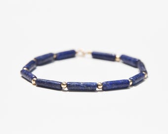 Lapis Lazuli and solid gold bracelet, cobalt blue Lapis tubes and solid 14 karat gold beaded minimalist bracelet