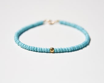 Dainty sleeping beauty Turquoise and 18k gold bracelet, baby blue gemstone and solid gold bracelet