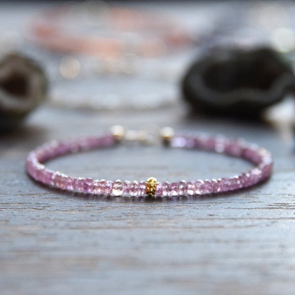 Pink Sapphire and gold bracelet.  Minimalist faceted gemstone bead and solid gold bracelet, 14k solid gold center bead and closure