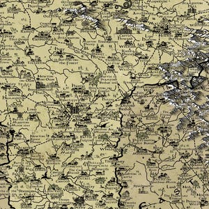 May include: A detailed, vintage-style map of a fictional land with a parchment background. The map features numerous towns, cities, rivers, and mountains. The map is titled "The North" and includes the text "The Wall" and "The Wolfswood".