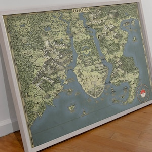 May include: A framed map of the Unova region from the Pokemon video game series. The map is in a vintage style with a blue and green color scheme. The map shows the different cities, towns, and routes in the region. The map is framed in a white frame.