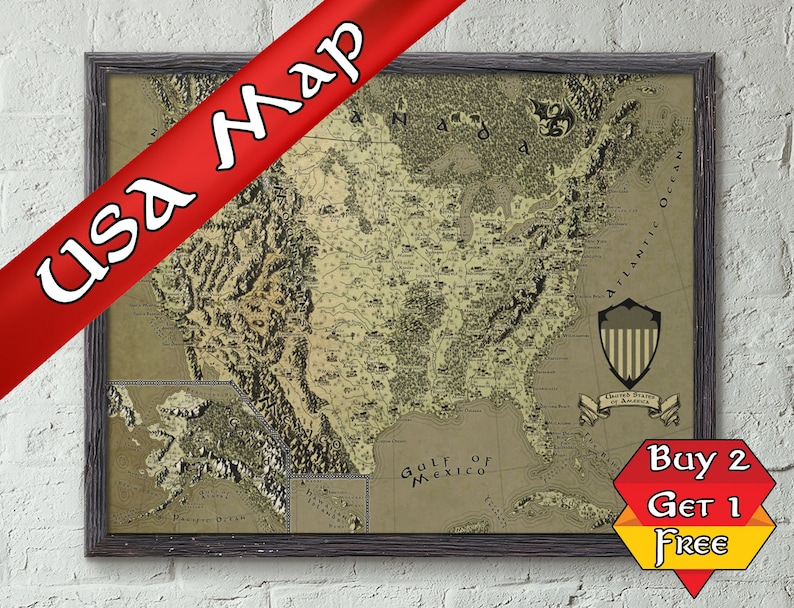 May include: A vintage-style map of the United States of America in a black frame. The map is printed on a beige background with brown and black details. The map includes the text "United States of America" and "Buy 2 Get 1 Free".