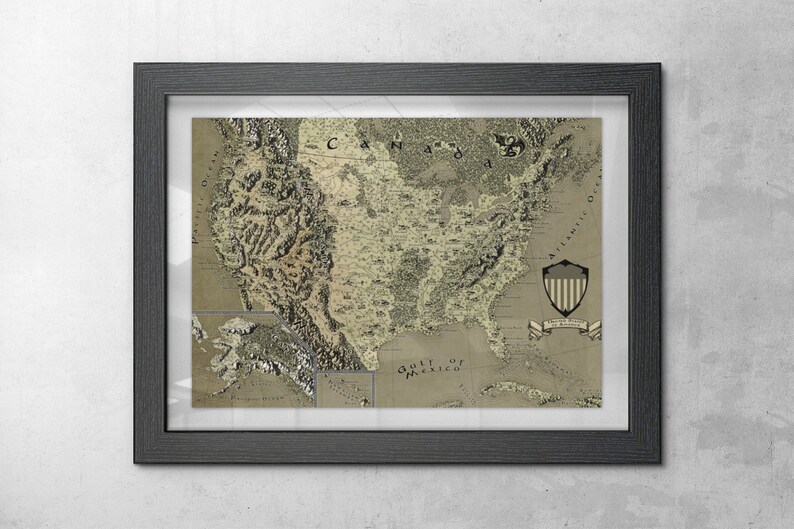 May include: A framed vintage-style map of the United States with a shield featuring the American flag in the bottom right corner. The map is printed on a beige background with brown and green details. The map includes the text "Gulf of Mexico" and "Canada".