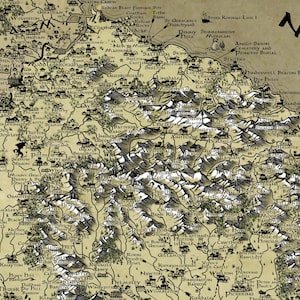 May include: A detailed map of a fictional land with mountains, rivers, and cities. The map is drawn in black ink on a parchment-like background. The map includes the text "The North" and "The Riverlands".