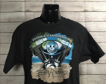 Distressed by hand done process to upcycle this one of a kind original. Womens size 1X Harley Davidson shirt