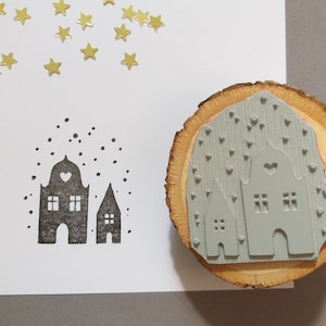 Stempel huizen in de sneeuw winter Kerstmis