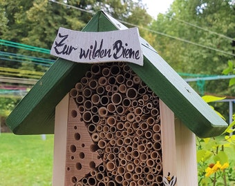 Wooden bee hotel with white sign | weatherproof & odorless paints | bee protection and garden design
