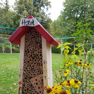 Wooden bee hotel with white sign | Weatherproof & odorless paints | Bee protection and garden design
