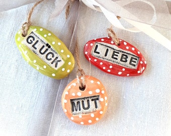 Wish stones, handmade gift tags, set of 3, love (red), happiness (green), courage (apricot) glazed on one side, with ribbon for hanging