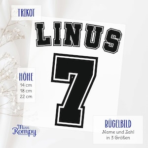 Könnte beinhalten: Schwarz-weißes Bügelbild mit dem Namen "LINUS" und der Nummer "7" in großer, fetter Schrift. Das Bügelbild ist in drei Größen erhältlich: 14 cm, 18 cm und 22 cm.