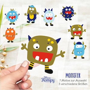 Peut inclure: Sept autocollants de monstres colorés avec différentes expressions. Les autocollants sont sur un fond transparent et sont prêts à être appliqués sur une variété de surfaces. Le texte "Miss Rompy" et "MONSTER" est visible en bas de l'image.