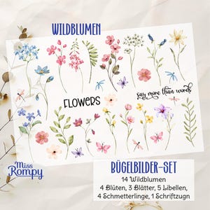 Könnte beinhalten: Aquarell-Blumenaufkleberbogen mit Illustrationen von Wildblumen, Schmetterlingen und Libellen. Das Blatt enthält die Wörter "FLOWERS" und "say more than words". Das Aufkleberblatt enthält auch den Text "BÜGELBILDER-SET".