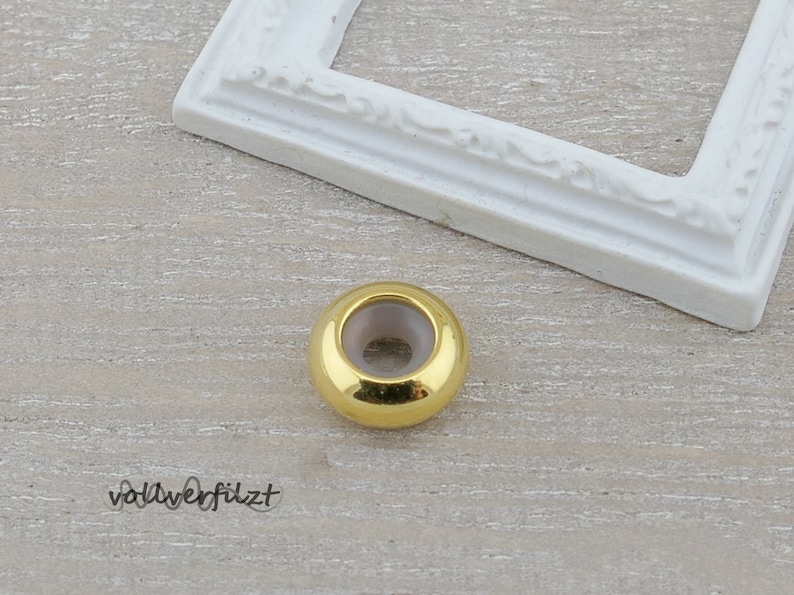 1x Stopperperle mit Gummi 9,5x4,0mm 3mm Loch Farbauswahl Verschluss Disc goldfarben