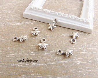 6x kleiner Anhänger Stern 7x4mm silberfarben Charm