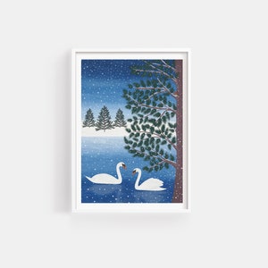 Christmas art print with mock up white frame with 2 swans in a lake, a tree in the foreground with a robin perched on a branch and 3 christmas trees in the background. The daytime blue sky background and falling snow.