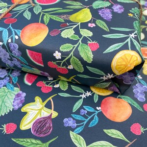 Summer fruit wrapping paper printed using vegetable inks. Fruits including, watermelon, lemons, oranges, pears, apples, grapes, mangoes, figs, peach, cherries. strawberries, raspberries, blackberries and blueberries. Originally painted with watercolours. Printed on a dark teal background.