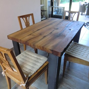 Dining table handcrafted from antique oak beams image 1
