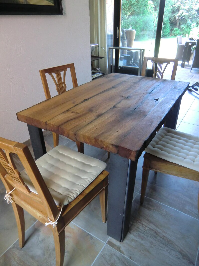 Dining table handcrafted from antique oak beams image 1