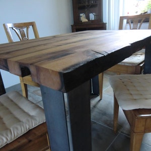 Dining table handcrafted from antique oak beams image 3