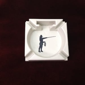 White Art Deco Ashtray with Swordsman Gaslight and Keys + Match Holder