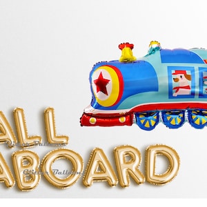 May include: Gold foil balloon letters spelling "ALL ABOARD" with a blue and red train balloon in the background.