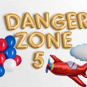 May include: Gold foil letter balloons spelling "DANGER ZONE 5" with a red airplane balloon and blue and red balloons.
