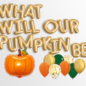 Puede incluir: Un arreglo festivo de globos con la frase "WHAT WILL OUR PUMPKIN BE" en letras doradas. Incluye un globo de calabaza naranja y una colección de globos naranjas, dorados, verdes y con confeti. Ideal para una revelación de género.