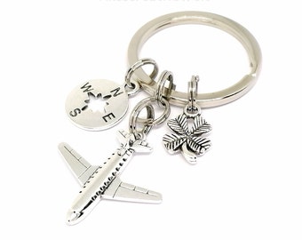 Airplane, lucky charm, shamrock or guardian angel, compass, key ring, have a good trip