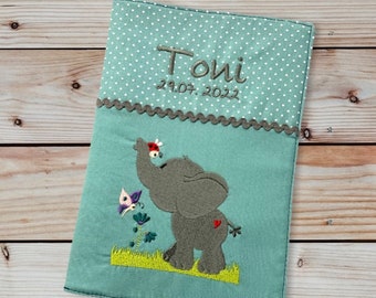 U-booklet cover - elephant with flowers on meadow - personalized with name and date - mint - vaccination certificate compartment - examination booklet