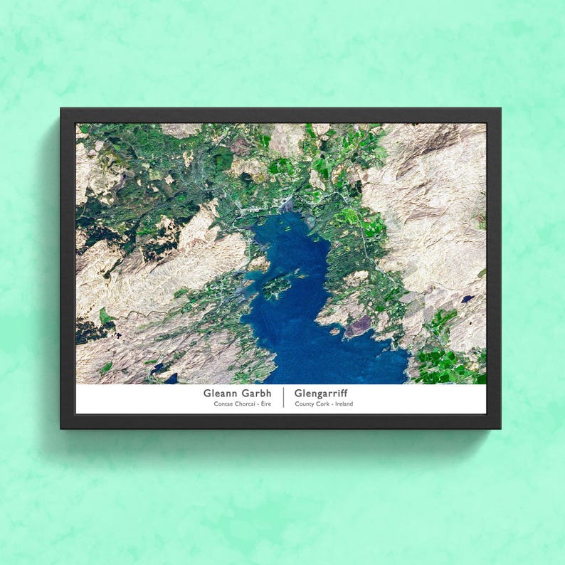 May include: A framed satellite image of Glengarrif, County Cork, Ireland and  Gleann Garbh, Connemara, Ireland. The image shows the coastline, water, and surrounding land.