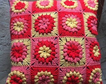 Decorative cushion with floral squares