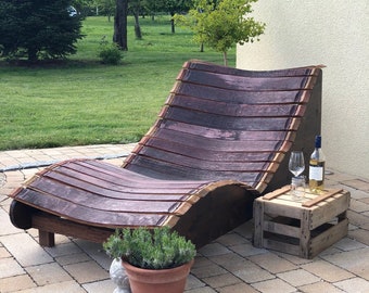 Wine barrel garden lounger made of barrel staves