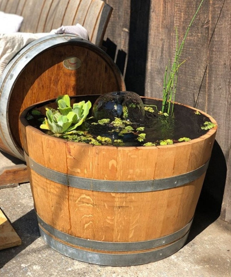 Mini pond made of used wine barrel image 1